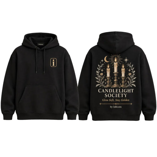 Front and back view of black INKCORA Candlelight Society hoodie featuring a small candle emblem on the chest and three glowing candles with crescent moon, stars, and botanical artwork on the back.